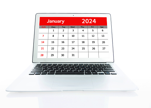 Calendar of January 2024 on a laptop screen against white background