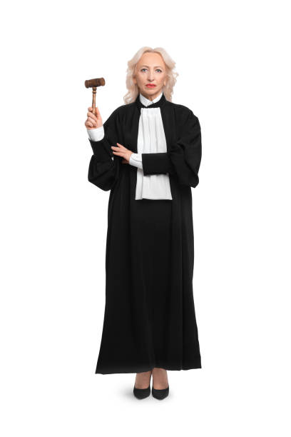 istock Senior judge with gavel on white background 1831875058