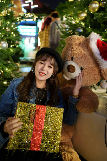 istock Asian woman celebrating Christmas 1831886121