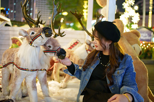 Asian woman celebrating Christmas