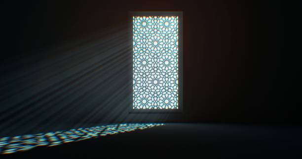istock A window embellished with a floral design allows light to softly caress the floor. 1831908015