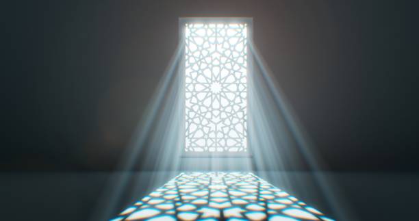 istock Light gently falls onto the floor from a window adorned with a floral motif. 1831908016