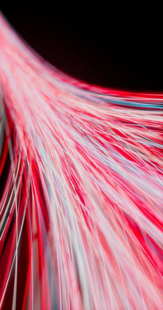 istock Slender streaks of light navigate the profound darkness. 1831909640