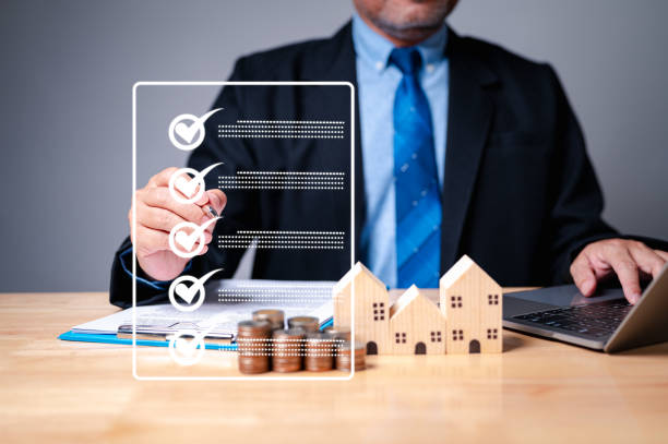 istock The meticulous businessman, armed with a comprehensive checklist, meticulously evaluated the investment property's potential before approving the mortgage loan. home, housing, estate 1831924116