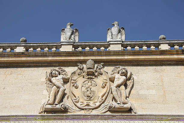 Ornament on facade of Conservatoire de Musique, previously the Pope's treasury in Avignon