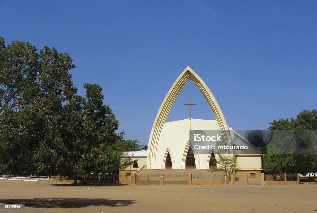 N'Djamena, Chad: Our Lady of Peace Catholic Cathedral N'Djamena, Chad: Notre Dame de la Paix Catholic Cathedral - between Félix Éboué and Charles de Gaulle Avenues - French Colonial architecture - the arch at Our Lady of Peace Cathedral is what remains of the original concrete roof, destroyed by war in 1980 Chad - Central Africa Stock Photo