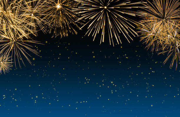 istock Golden fireworks on blue background with sparks. New year celebration concept 1831956406