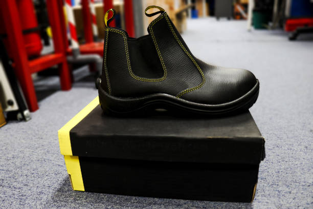 istock Photo of black leather safety boots with box 1832013718