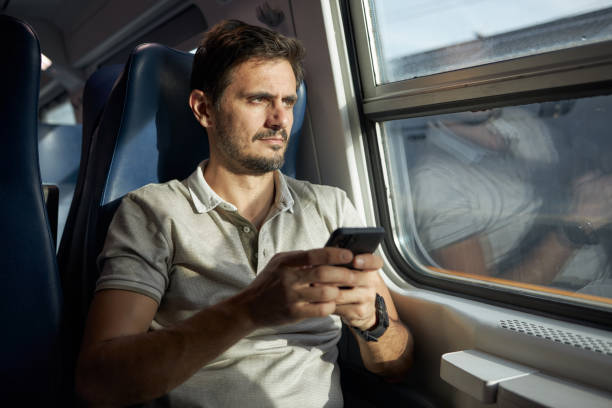 istock Young male tourist traveling by subway train 1832021419