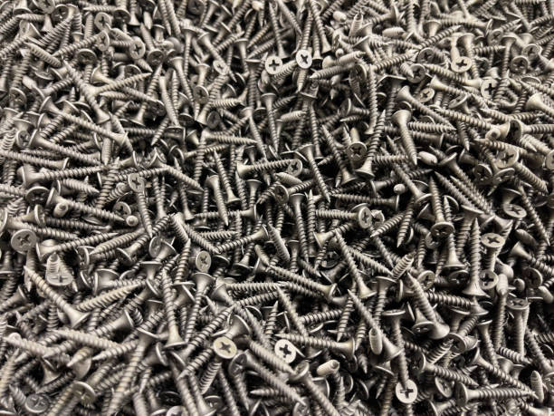 istock Pile of screws. Close-up. Background and texture. 1832042912