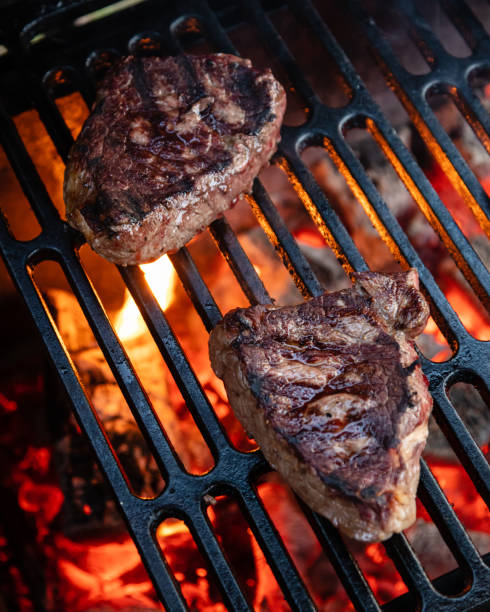 istock Beef steak cooked on a charcoal grill 1832048684