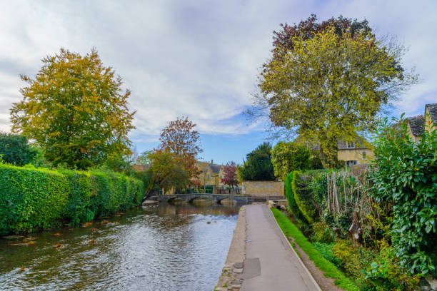istock Typical houses, and the river Windrush, in Bourton-on-the-Water 1832052829