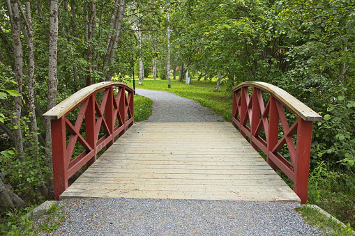 Footbridge in public park in Lulea, Sweden, Europe