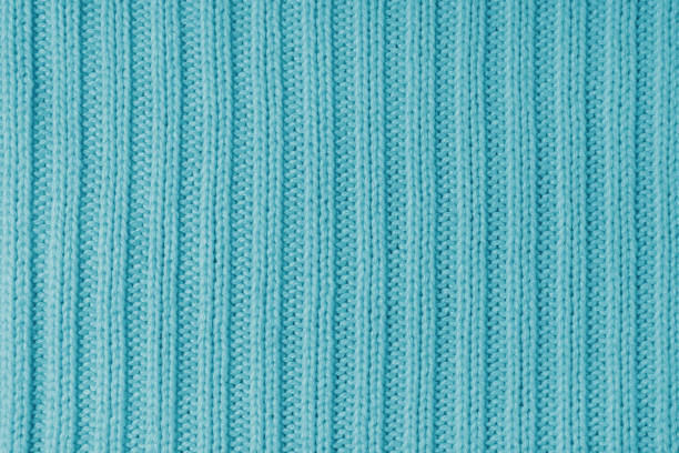 istock Jersey textile background , turquoise striped knitted fabric, cloth surface 1832092087