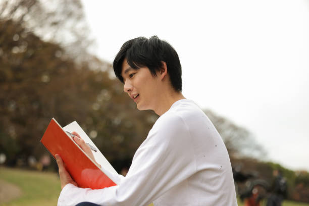 Asian individuals living their life to the fullest, by pursuing their hobbies, passions, and dreams.  Young man enjoying their hobbies with a positive, focused and joyful expressions