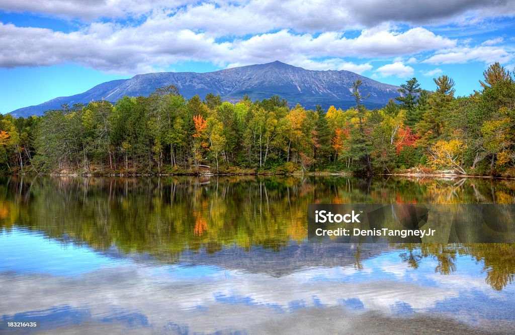 Mount Katahdin Mount Katahdin is the highest mountain in Maine. Katahdin is the centerpiece of Baxter State Park: a steep, tall mountain formed from underground magma. Photo taken during the fall foliage season. Maine fall foliage ranks with the best in New England bringing out some of  the most beautiful foliage in the United States Mt Katahdin Stock Photo