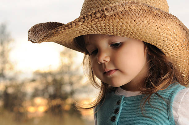istock Young girl, cowboy hat 183217027