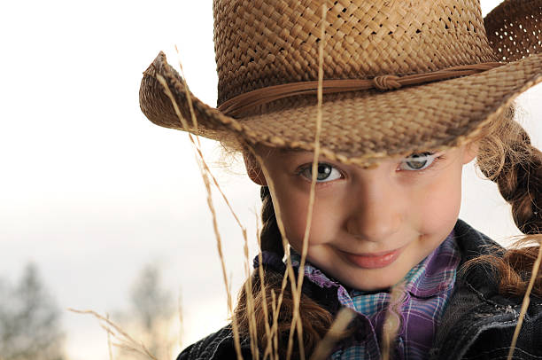 Young girl, cowboy hat