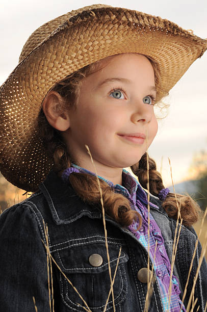 istock Young girl, cowboy hat 183217290