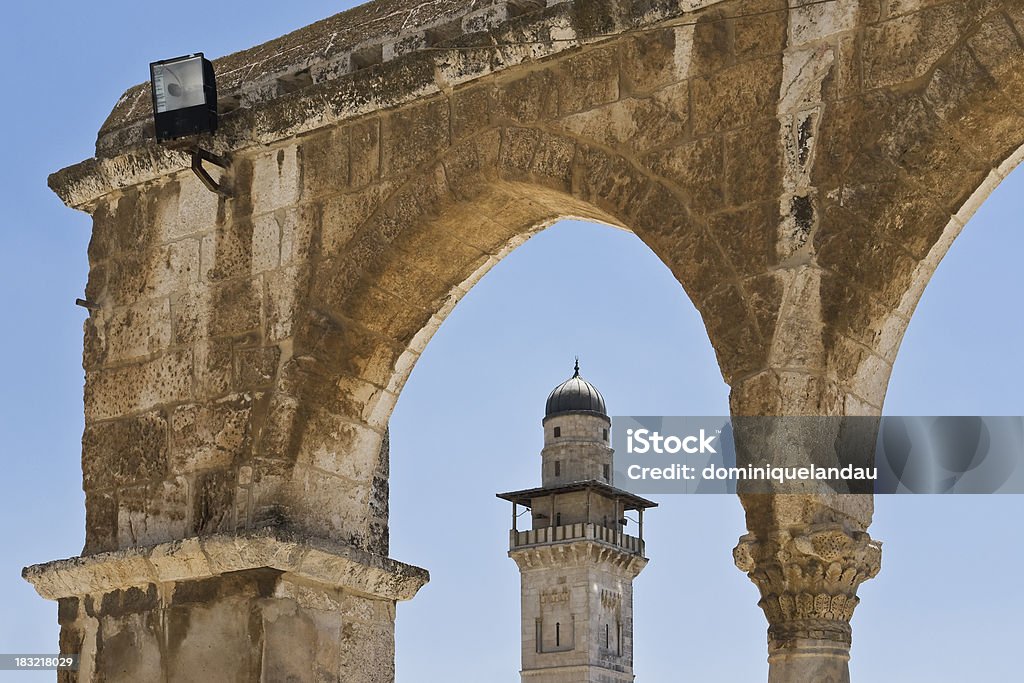 Minaret in Old City Jerusalem Minaret  view in the middle of an arch Arabia Stock Photo