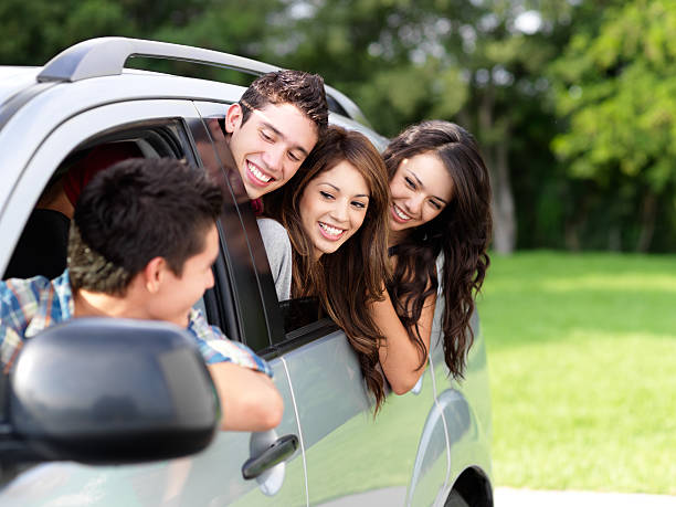 istock Playful friends in a car 183218907