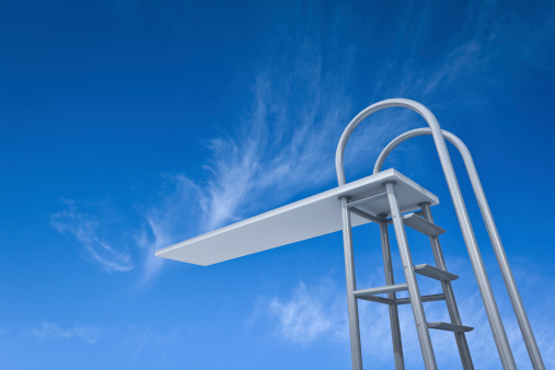 High jump diving board with blue sky in the background.Could be a symbolize taking a leap or be useful in a diving composition.This is a detailed 3d rendering.