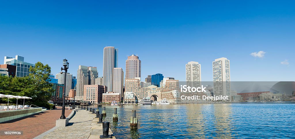 Boston Rowes Wharf City Skyline in the USA City skyline at Rowe's Wharf area of Boston, with clear blue skies on a summers day, USA Boston - Massachusetts Stock Photo