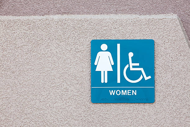 istock Women's Restroom Sign with Handicap Symbol 183219945