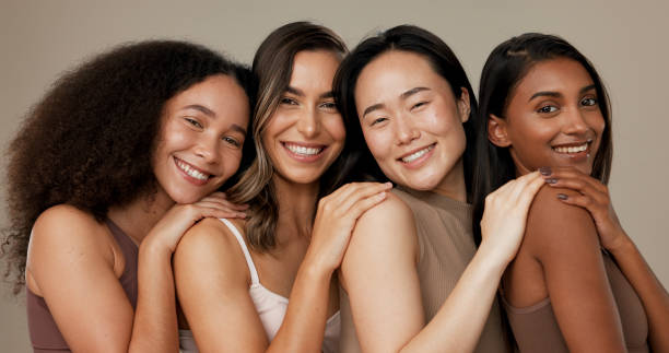 diversity face, beauty group and happy women with natural cosmetics, facial skincare glow and studio self care. woman empowerment, makeup and equality portrait of model friends on grey background - tratamento de pele imagens e fotografias de stock