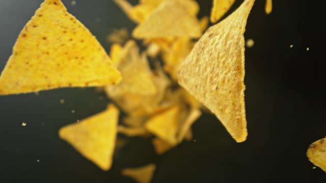 Super Slow Motion of Flying Tortilla Chips.