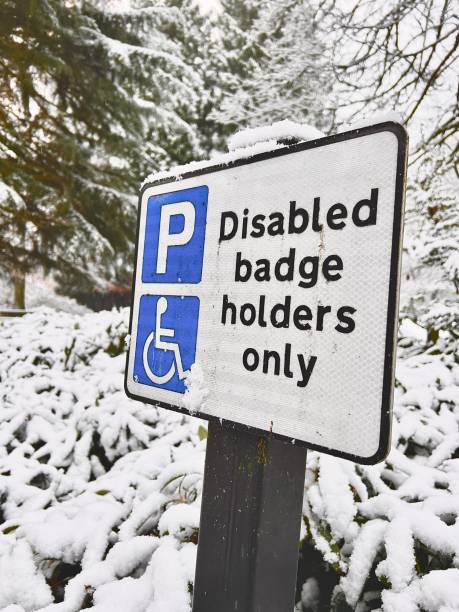 istock A disability access car parking sign with snow in the background 1832251644