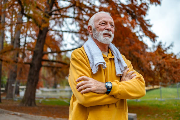 istock Senior man runner with towel around his neck. 1832267749