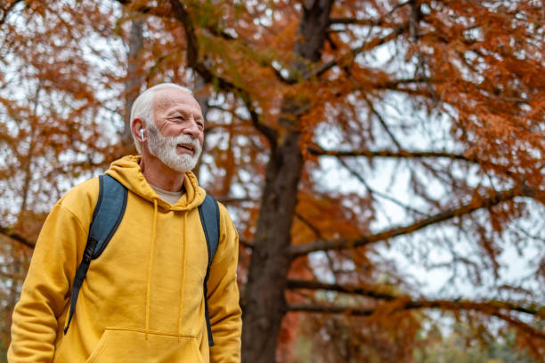 istock Happy senior hiker looking away with a smile 1832269841