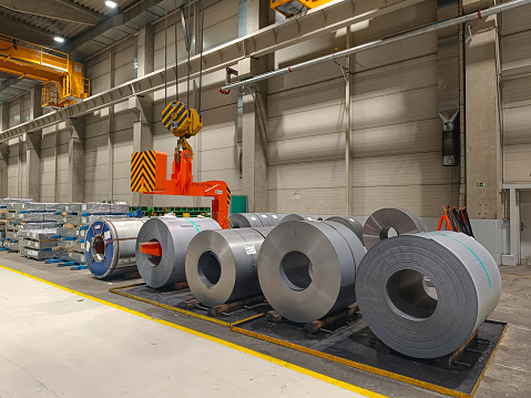 Coils with steel sheets for the production of car bodies in the automotive factory