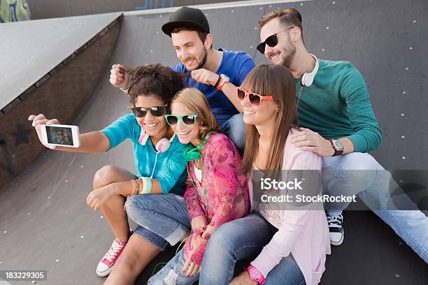 Young People Having Fun At The Skatepark Stock Photo - Download Image Now - Adolescence, Adult, Beautiful People