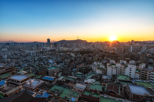 Sunset view over Seoul city with view of N Seoul Tower. Taken from Changsindong, Seoul, South Korea on December 3rd 2023