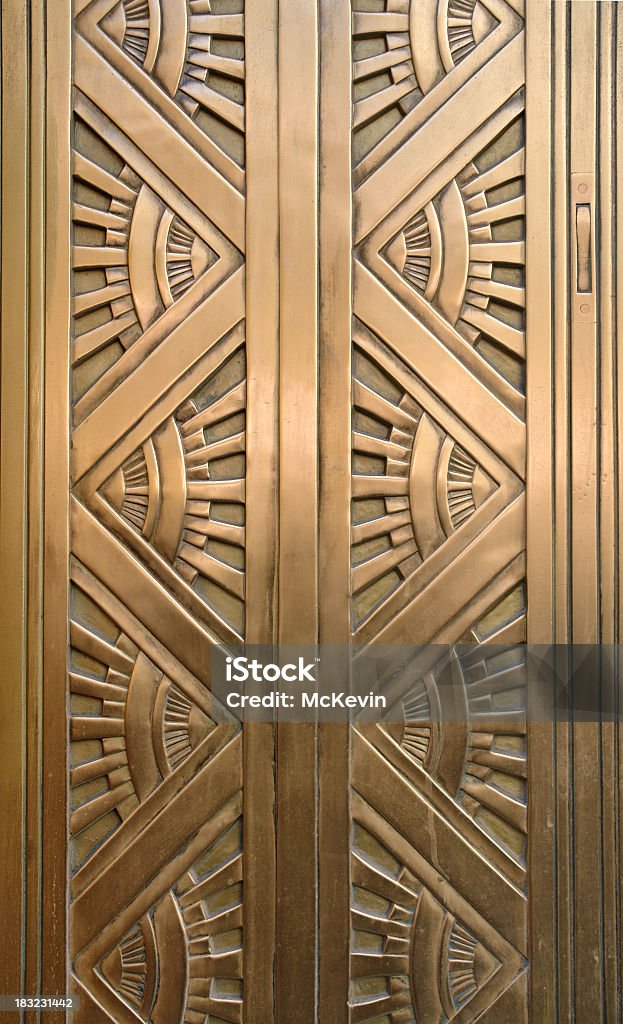 diamond art deco Detail of an Art Deco style bronze door taken in New York City. The design features alternating triangular patterns with rays expanding outward from the point of each triangle suggesting sun rays. (See similar in the "Art Deco Style" light box.) Art Deco Stock Photo