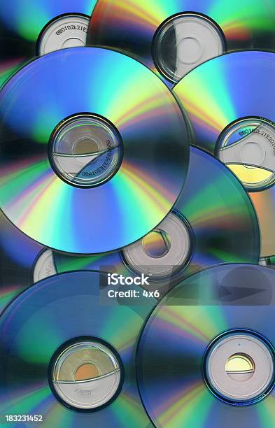 Fondo De Cdrom Foto de stock y más banco de imágenes de CD-ROM - CD-ROM, Compact Disc, Música