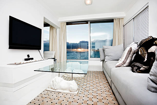 istock Interior of a home theater with couch, television and table 183232088