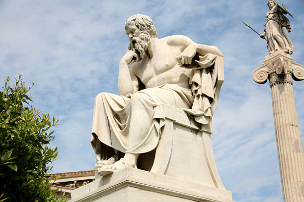 Statue of Socrates, the philosopher, with sky in distance (469–399 BC), ancient Athenian philosopher. This is his statue, located before the Academy of Athens, Greece. classical style stock pictures, royalty-free photos & images