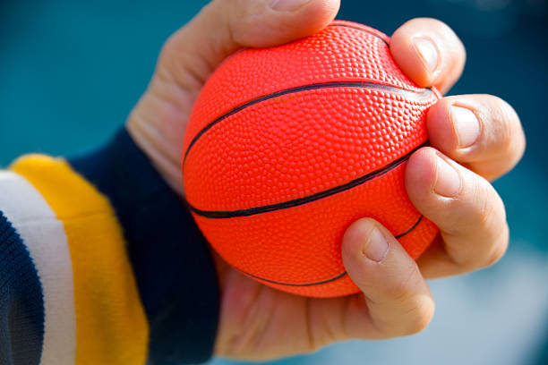 держите tight - basketball sport human hand reaching стоковые фото и изображения