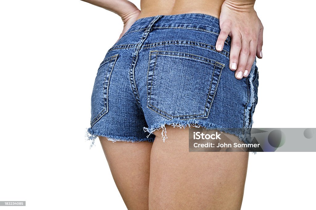 Pantalones cortos mujer usando nalga - Foto de stock de Vaqueros - Pantalón libre de derechos