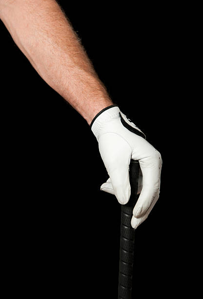 istock Golfer's hand leaning on club 183234679