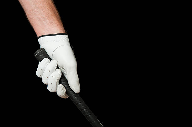 Golfer's hand gripping club