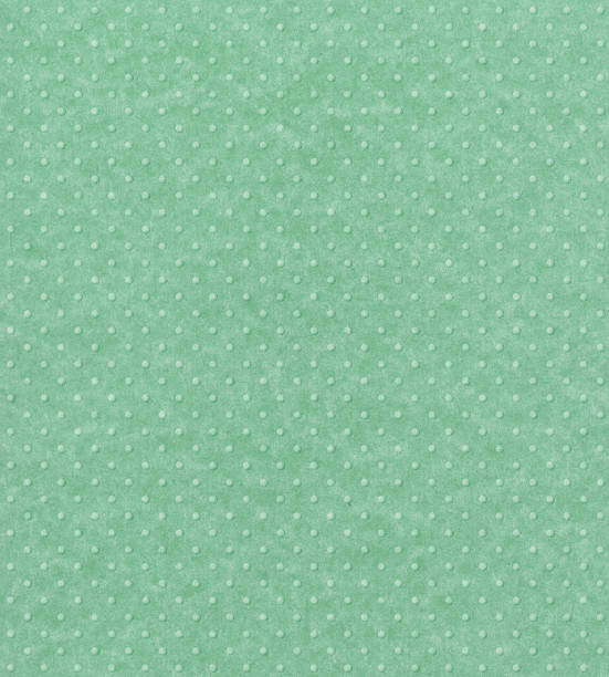istock pastel green paper with raised dots 183235359