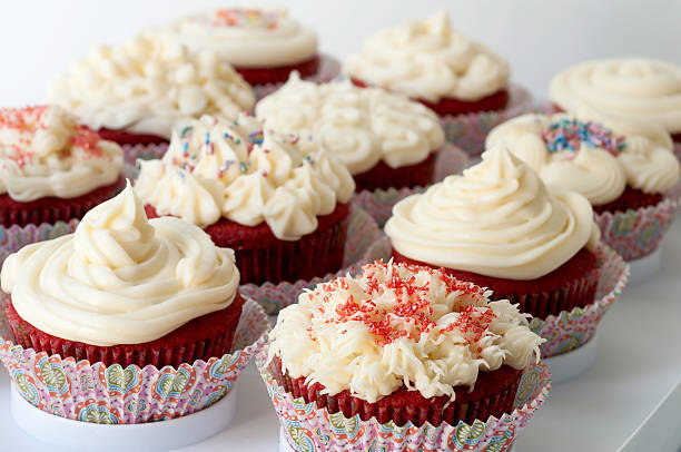 istock Red Velvet Cupcakes with Cream Cheese Icing 183235803