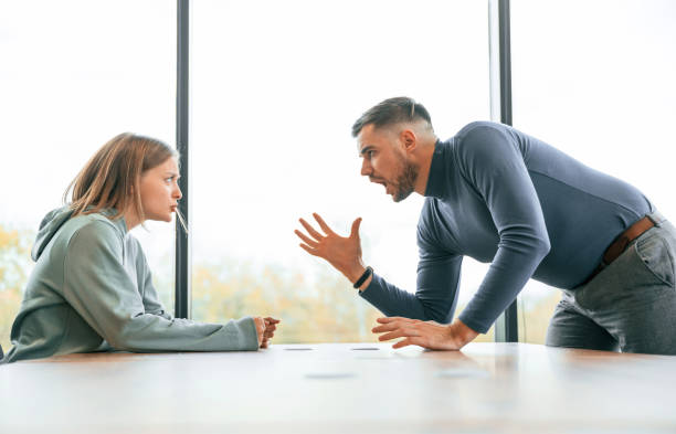istock Man is screaming at his girlfriend, conception of quarrel 1832360699