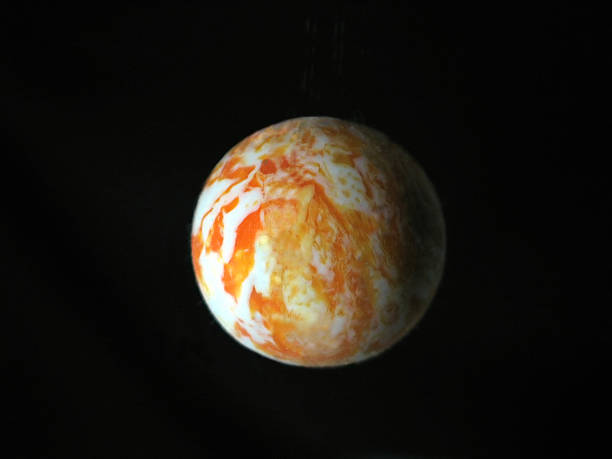 istock Marbled multicolored sphere that looks like planet on black. 183236083