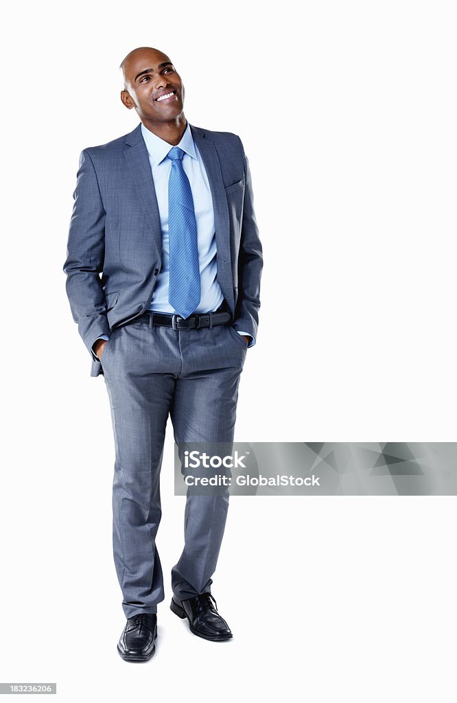 Afro-americano Homem de Negócios de pé com as mãos nos bolsos - Royalty-free Olhar para Cima Foto de stock