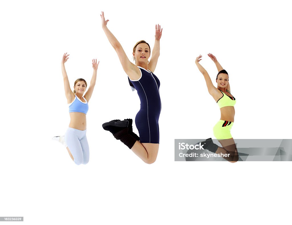 Três garotas pulando. - Foto de stock de Academia de ginástica royalty-free